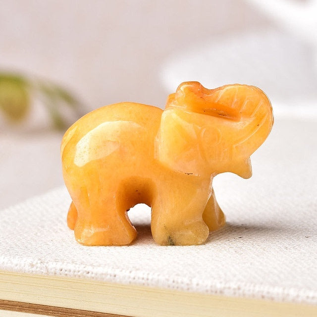 Sacred Moon Candle Co healing crystal elephant stone carved from orange gemstone
